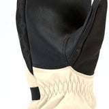 Gordini Women's Stomp Mitt - A pair of black mittens with a textured palm and thumb, featuring a strap closure at the wrist.