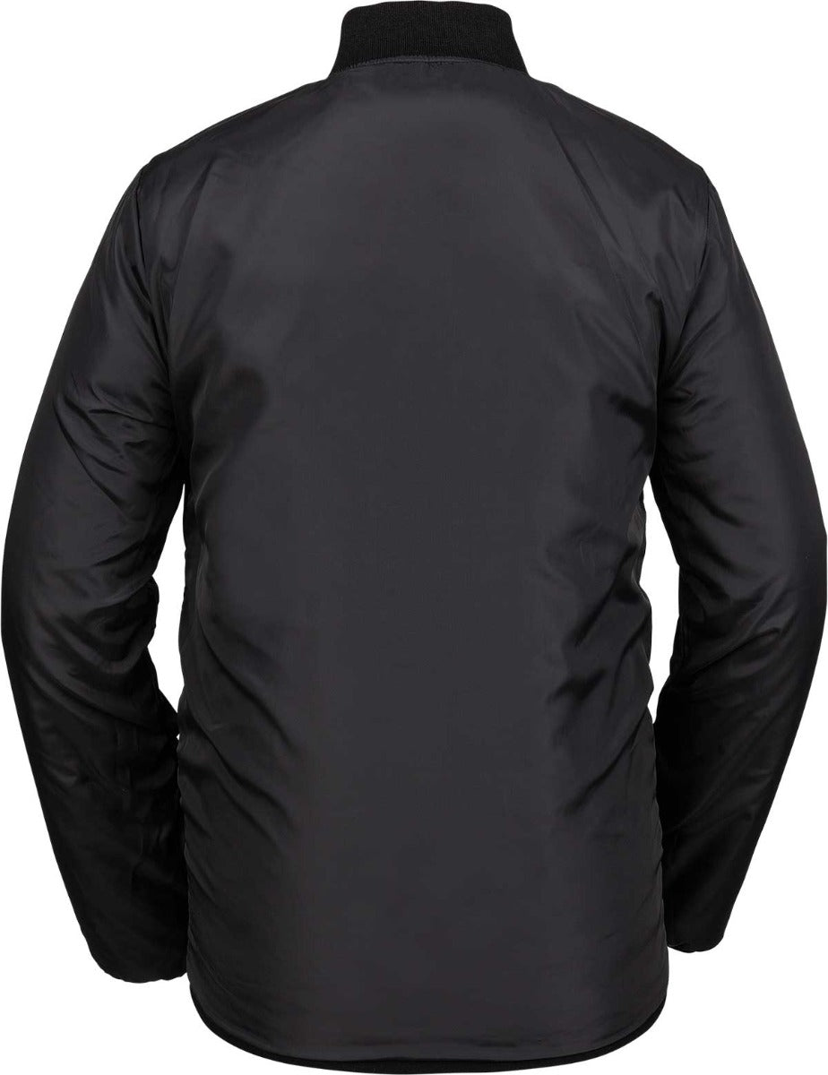 Volcom Women's Reversible Polar Shell Jacket 2020 - A black jacket with a subtle white pattern on one side and solid black on the other, featuring a high collar and zippered pockets.