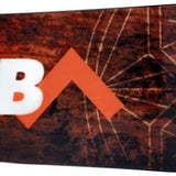 Head Anything Lyt Snowboard 2024 - A brown snowboard with a geometric pattern on its bottom.