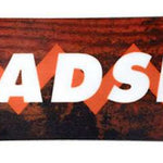 Head Anything Lyt Snowboard 2024 - A brown snowboard with a geometric pattern and white lettering on top.