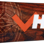 Head Anything Lyt Snowboard 2024 - A brown snowboard with a geometric pattern and white lines, featuring a distinctive orange logo on the top left corner.