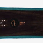 Head Day Lyt Snowboard 2023 - A black snowboard with a blue stripe along its edge.