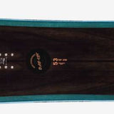 Head Day Lyt Snowboard 2023 - A black snowboard with a blue stripe along its edge.