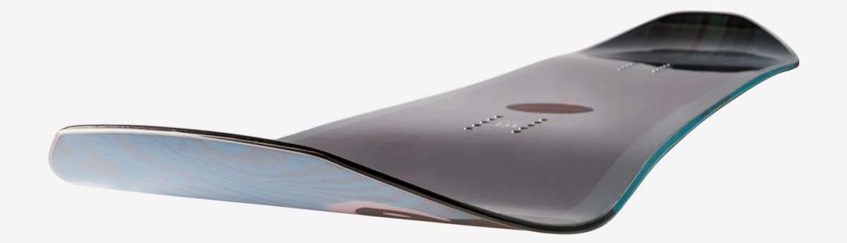 Head Day Lyt Snowboard 2023 - A snowboard with a light blue top and dark gray bottom, featuring a subtle wood grain pattern on its surface.