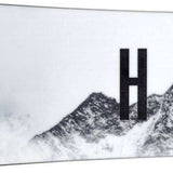 Head Daymaker Snowboard 2024 - A white snowboard with a black logo on top of it.