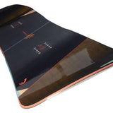 Head Daymaker Lyt Snowboard 2024 - A black snowboard with a red logo and white lettering on top, featuring a brown wood grain pattern at the bottom.