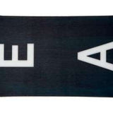 Head Daymaker Lyt Snowboard 2024 - A brown snowboard with a black stripe down the middle and white lettering on top.