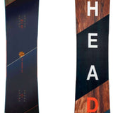 Head Daymaker Lyt Snowboard 2024 - A black snowboard with a diagonal orange stripe and small red logo near the top.