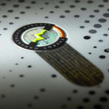 Head E Instinct LYT Snowboard 2023 - A black snowboard with a white stripe down the middle and yellow accents on the bindings.