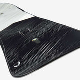 Head E Instinct LYT Snowboard 2023 - Black snowboard with white accents and a distinctive logo on top.
