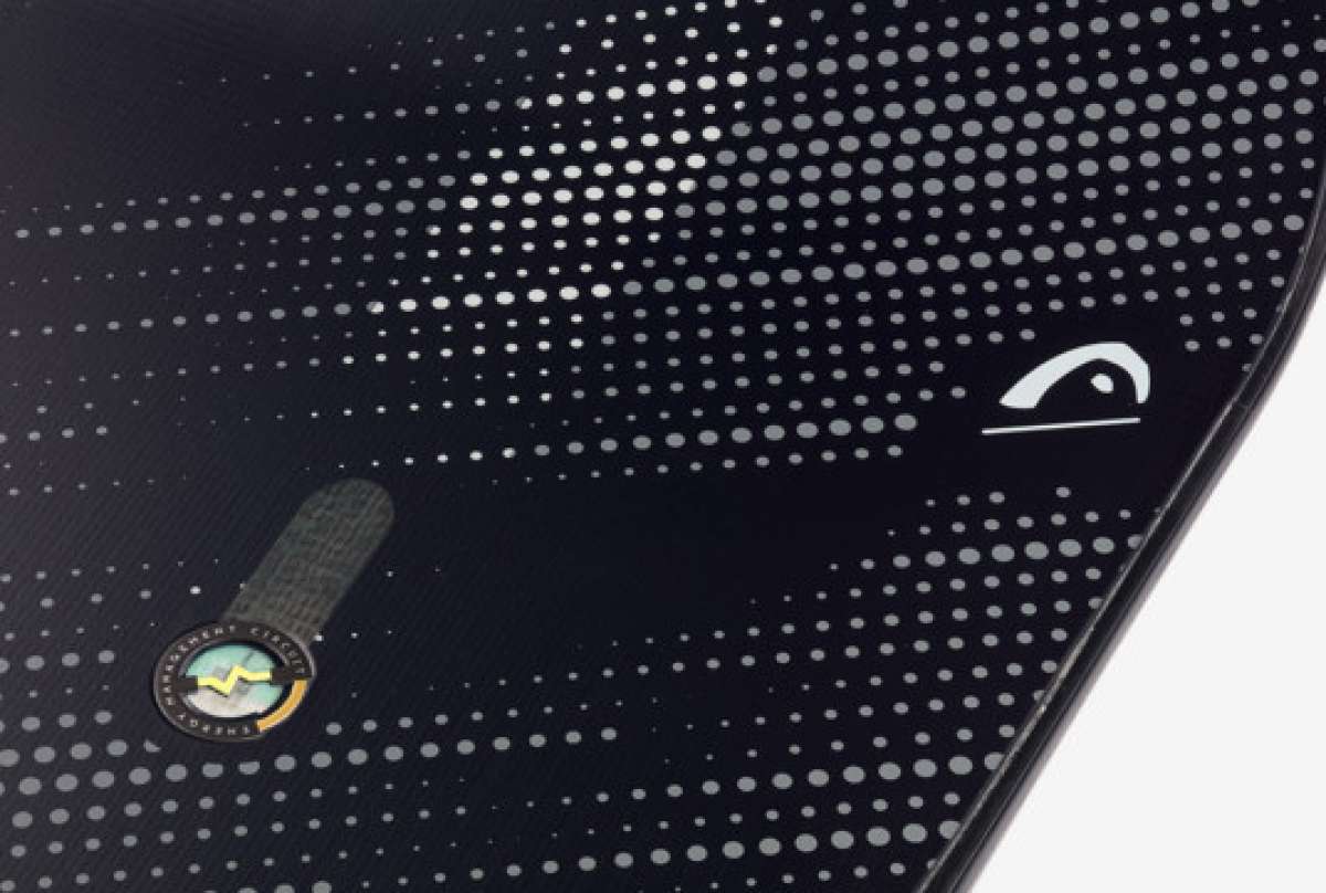 Head E Instinct LYT Snowboard 2023 - A black snowboard with a white logo on the top right corner.