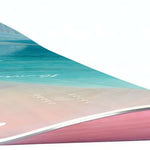 Head Women's Fountain Snowboard 2024 - A snowboard with a blue and white design on top of a pink base.