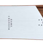 Head Gamechanger Snowboard 2024 - A brown snowboard with a white stripe on top and black text that reads "Gamechanger".
