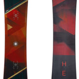 Head Rush Snowboard - A snowboard with a red, black, and gold geometric pattern on its top surface.