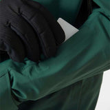 Helly Hansen Swift 3 Layer Shell Jacket 2022-2023 - A dark green waterproof shell jacket with silver zipper and reflective trim.