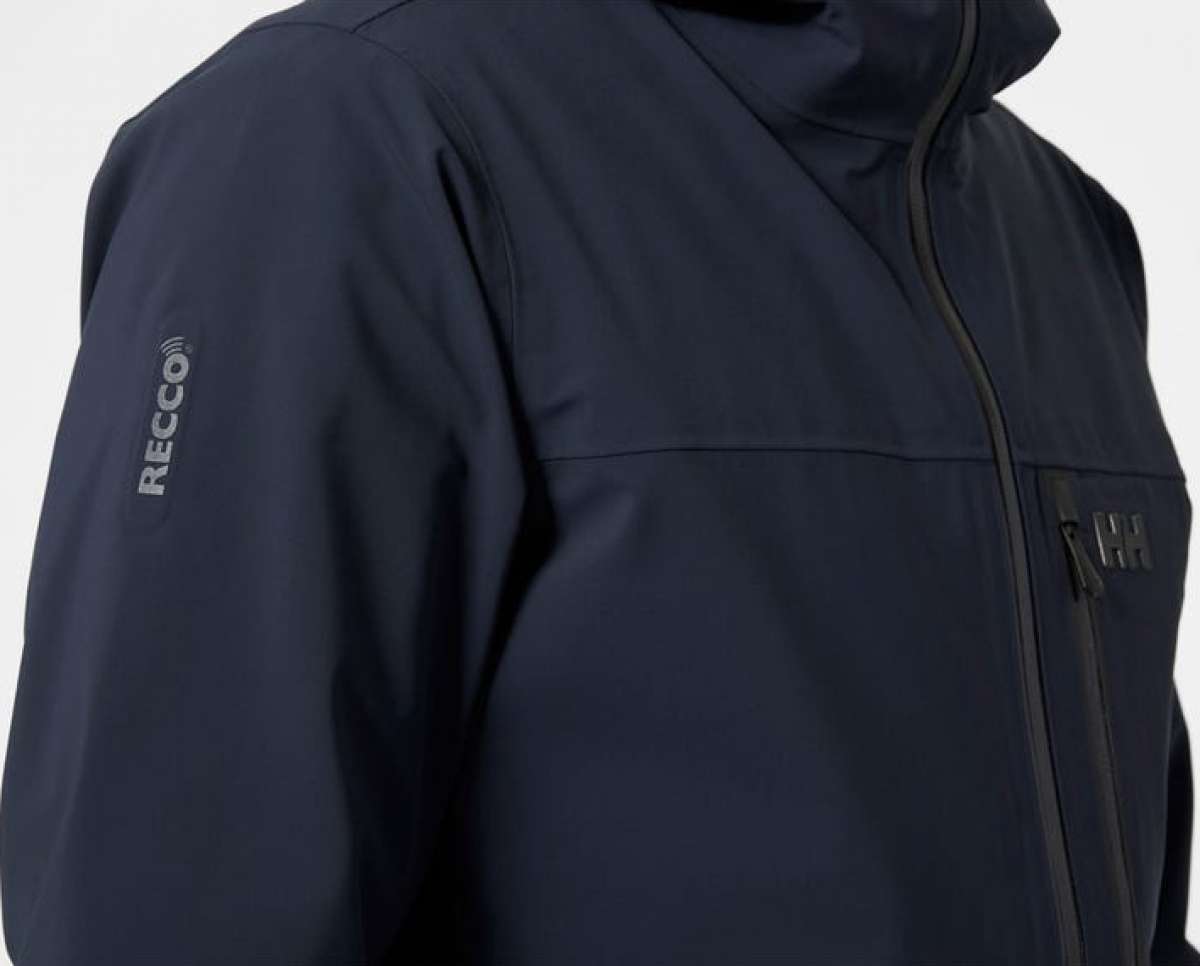 Helly Hansen Swift 3 Layer Shell Jacket 2022-2023 - A navy blue jacket with a zippered chest pocket and adjustable cuffs.