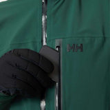 Helly Hansen - A dark green, waterproof shell jacket with a hood and zippered pockets.