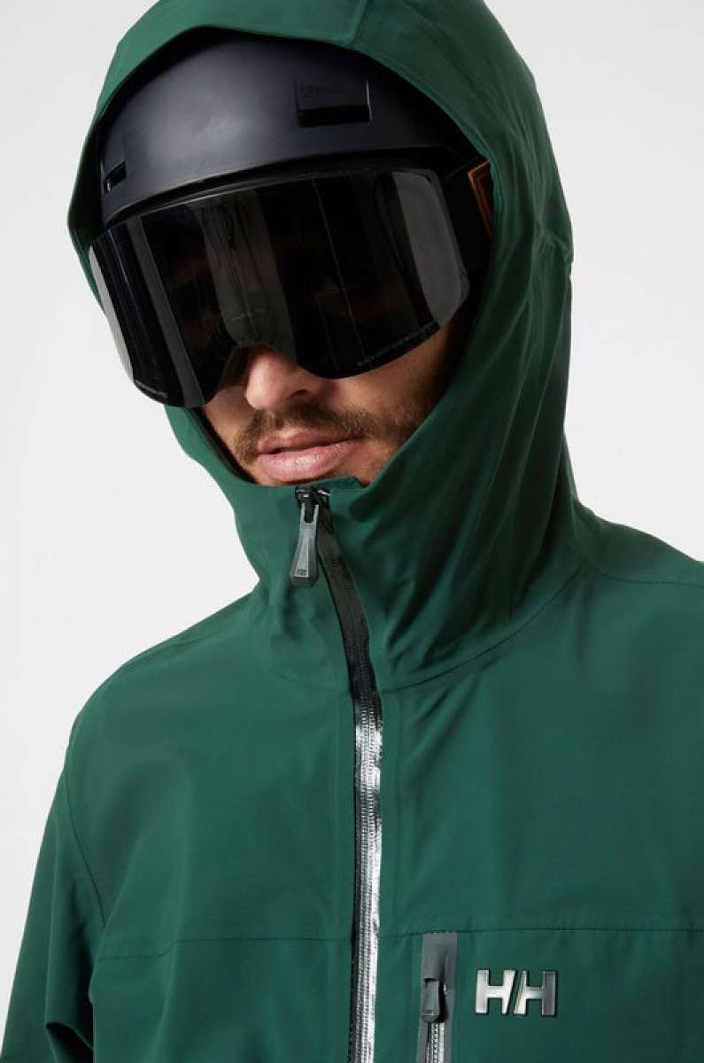 Helly Hansen Swift 3 Layer Shell Jacket 2022-2023 - A dark green jacket with a hood, zippered pockets and adjustable cuffs.