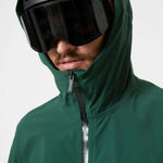 Helly Hansen Swift 3 Layer Shell Jacket 2022-2023 - A dark green jacket with a hood, zippered pockets and adjustable cuffs.