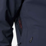 Helly Hansen Swift 3 Layer Shell Jacket 2022-2023 - A dark blue jacket with a black zipper and red accents on the inside of the collar.