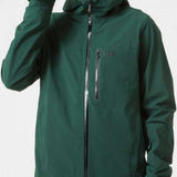 Helly Hansen - A dark green jacket with a hood, zippered pockets and a black zipper.