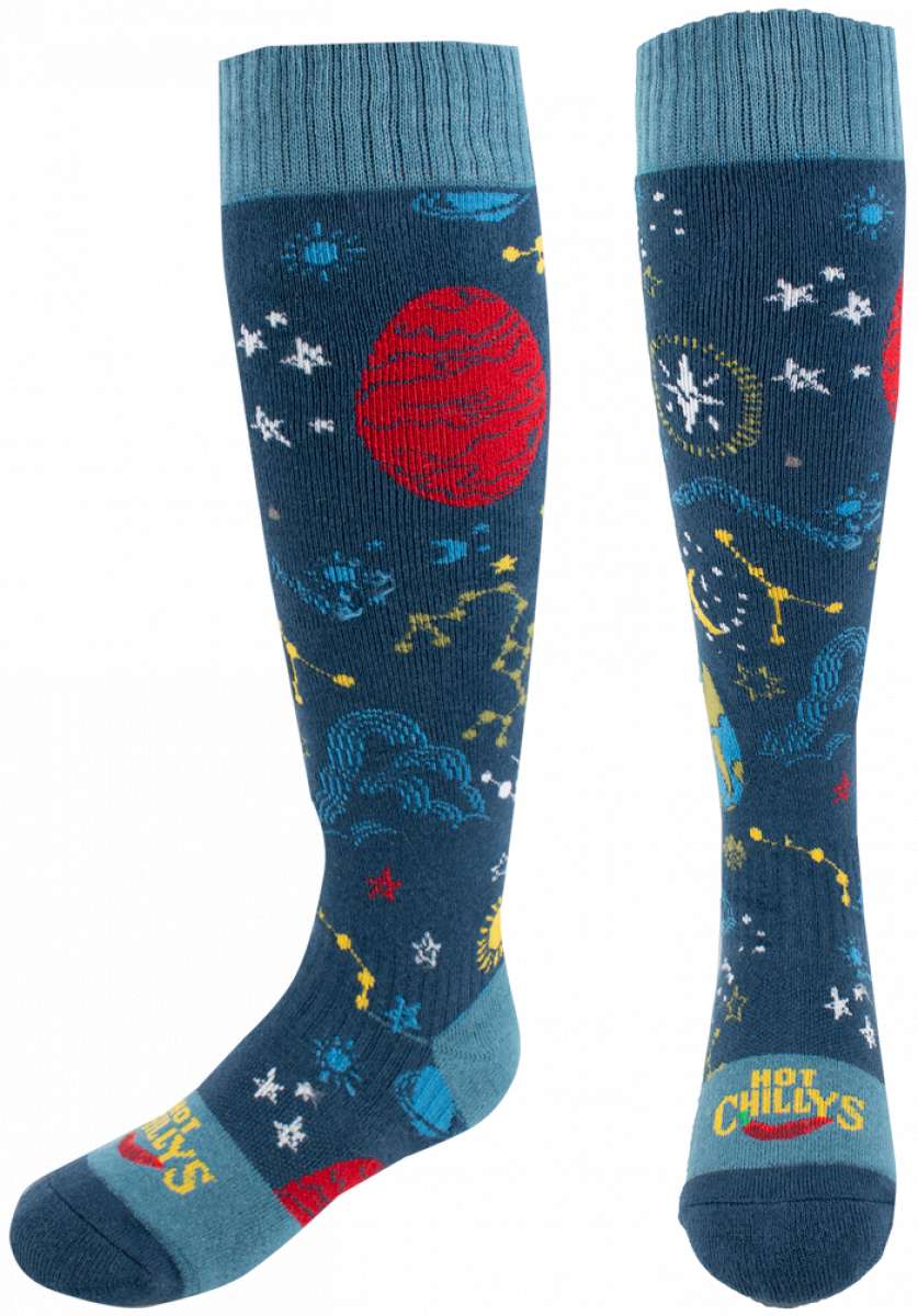 Hot Chillys Youth Nebula Mid Volume Sock 2024 - A pair of navy blue socks with a nebula pattern in shades of red, yellow, and white.