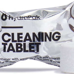 Hydro Flask - Natural cleaning tablets in a white wrapper with blue text, featuring an illustration of a leaf and a water droplet.