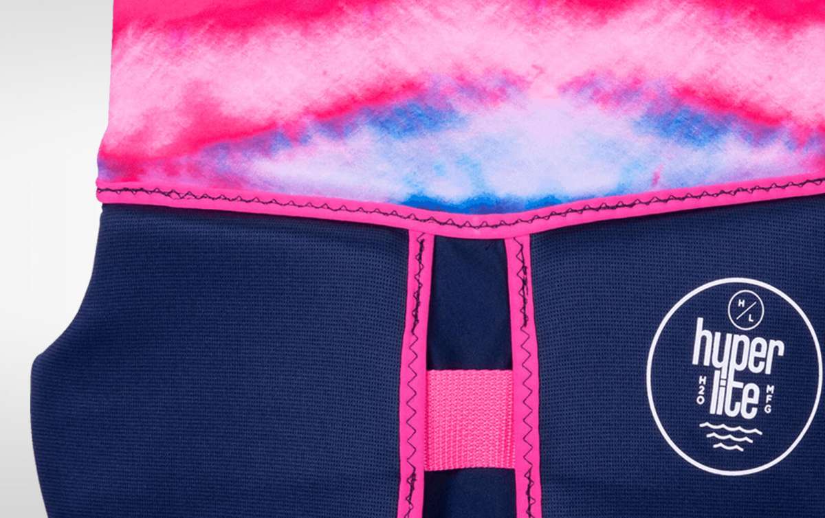 Hyperlite Girls Indy CGA Vest 2022 - A pink, blue and white tie-dye patterned vest with a navy-blue background.