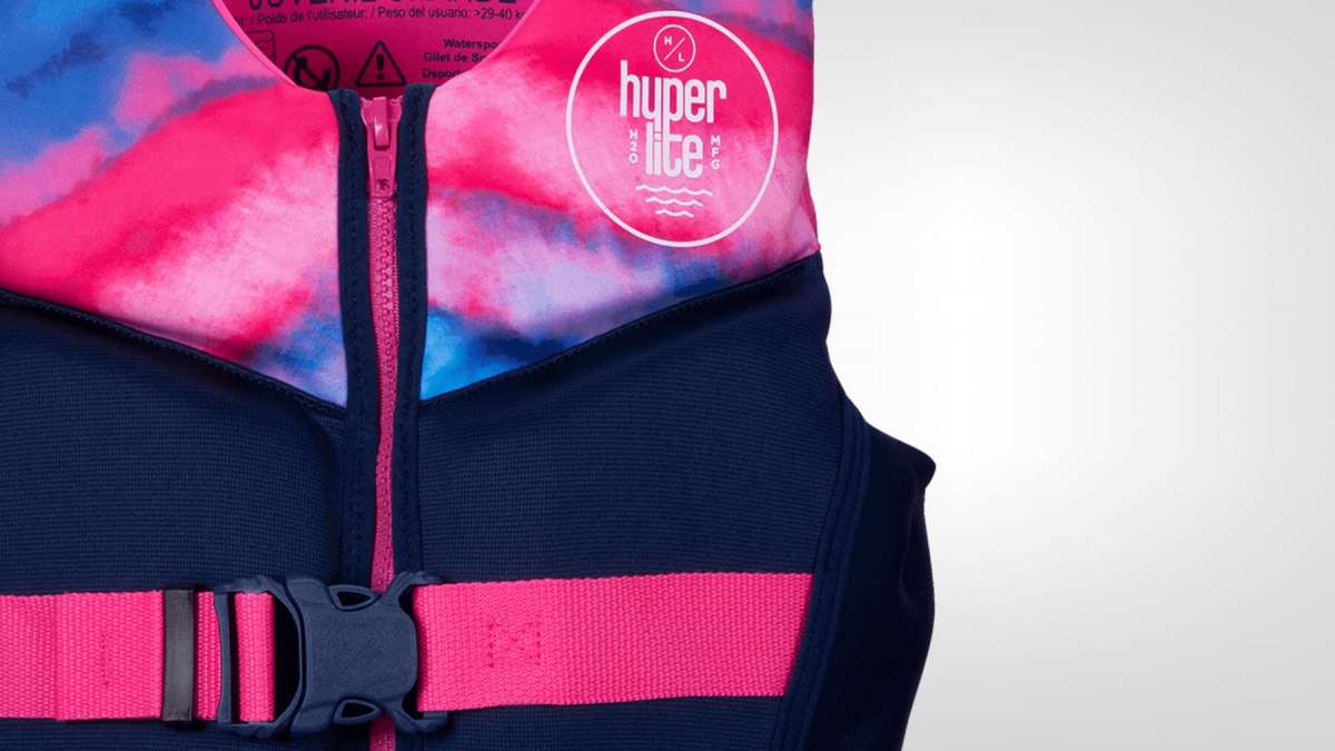 Hyperlite Girls Indy CGA Vest 2022 - A pink, blue and white tie-dye patterned life vest with a zipper down the front.