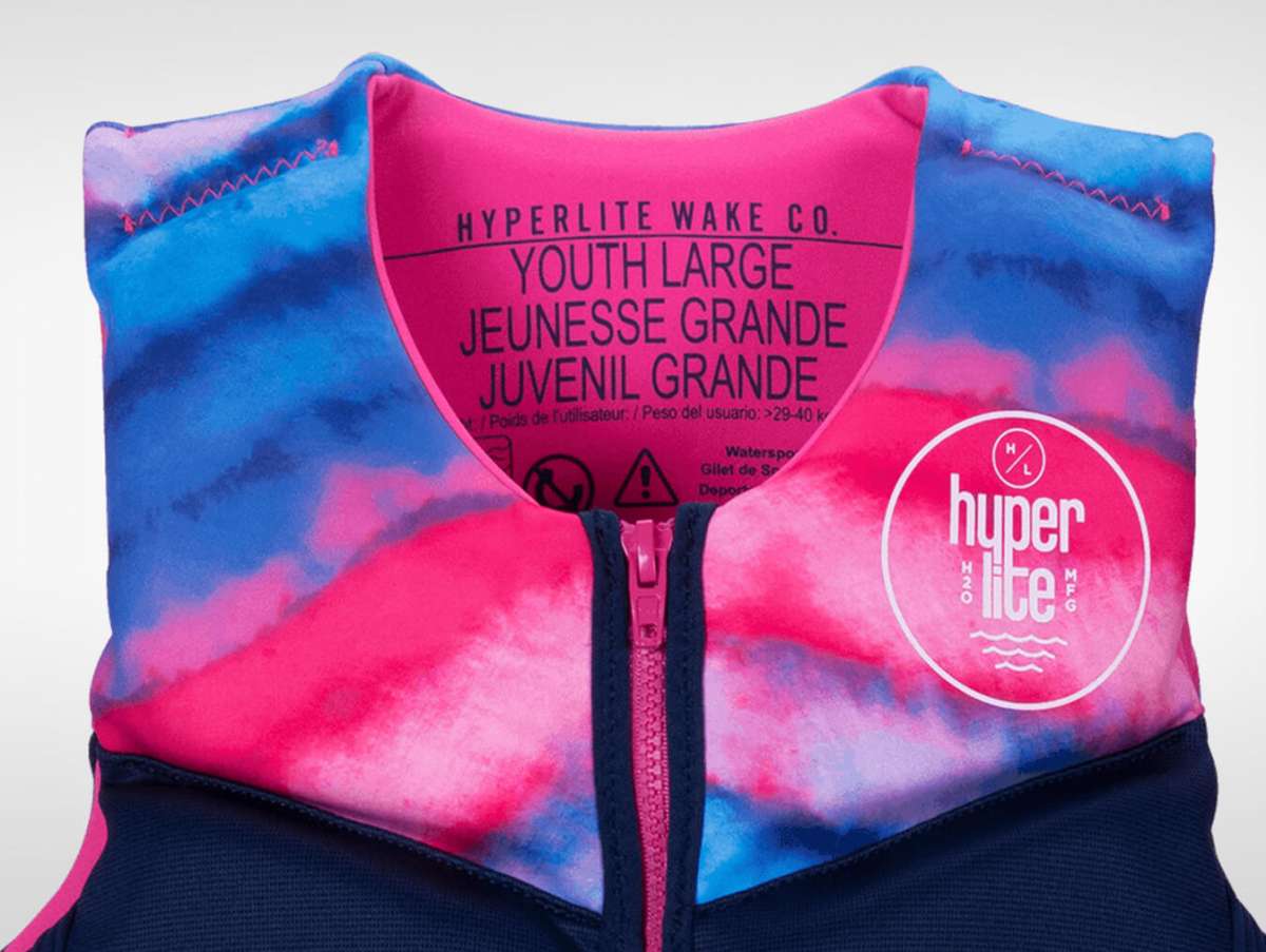 Hyperlite Girls Indy CGA Vest 2022 - A pink, blue and white tie-dye patterned life vest with a zipper down the front.