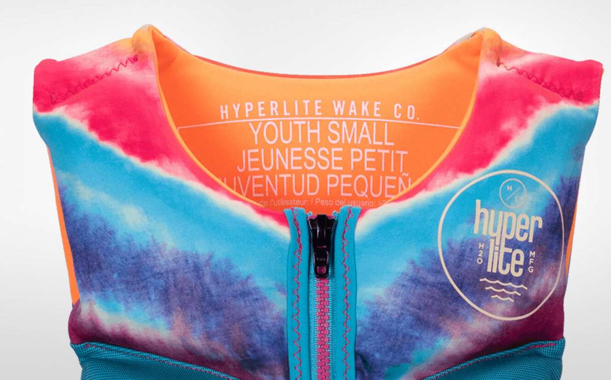 Hyperlite Girls Indy CGA Vest 2022 - A pink, blue and white life vest with a logo on the upper right side.