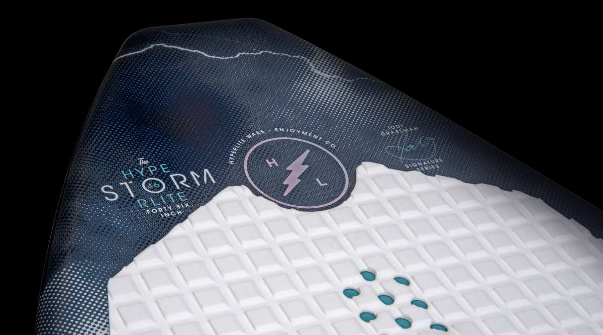 Hyperlite Storm Wakesurf Board 2022 - A navy blue board with a white logo and white lettering on top of it.