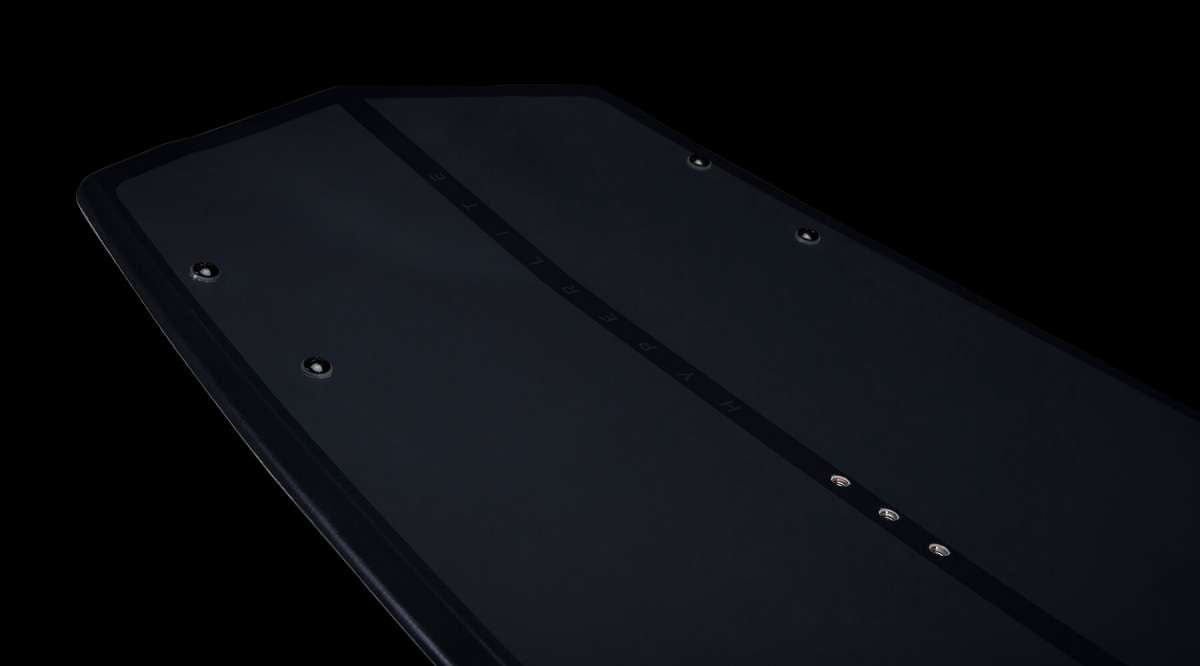 Hyperlite Trever Maur Blueprint Wakeboard 2022 - A black wakeboard with a white logo on top and a blue outline around the edges.