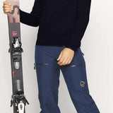 Icepeak Ladies Evansdale 1/4 Zip Top 2022-2023 - A black quarter-zip sweater with a zipper and collar, worn by a woman in a white beanie.