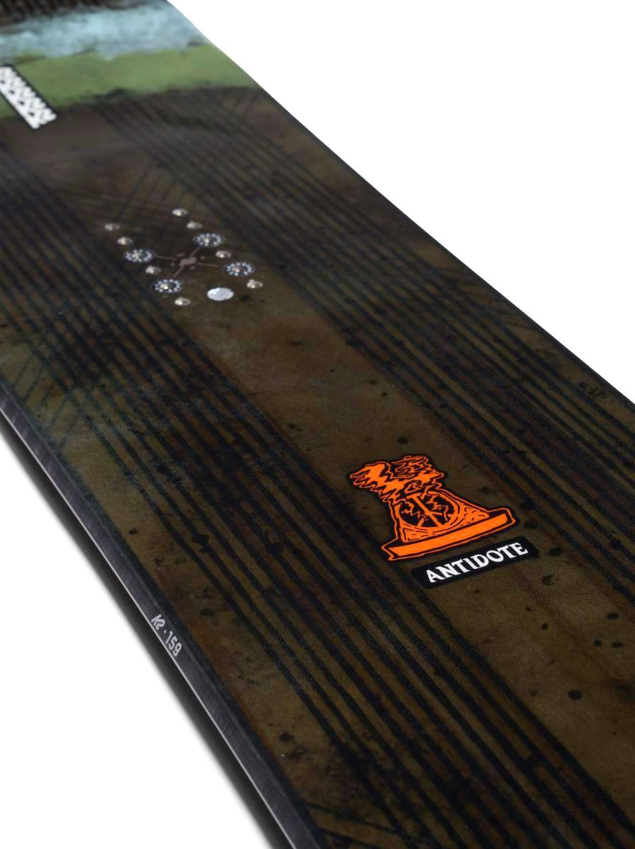 K2 Antidote snowboard 2023 features a black top with red and white graphics.