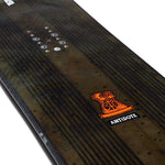K2 Antidote snowboard 2023 features a black top with red and white graphics.