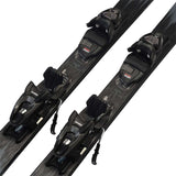 K2 Disruption 76 System skis feature a black and gray design with M2 10 bindings.