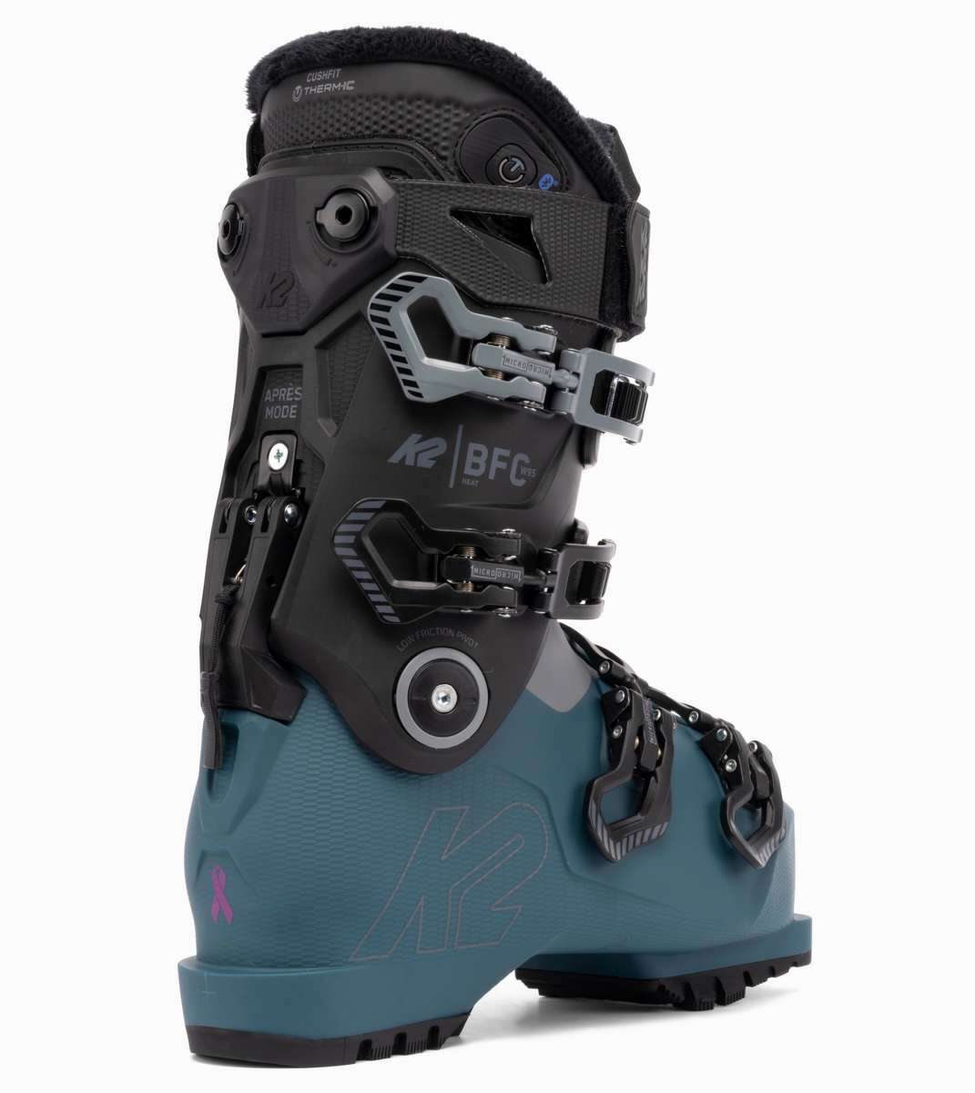 The K2 Ladies BFC 95 Heat GripWalk Ski Boots are a pair of boots designed for women, featuring a black and white color scheme. They have a heat grip sole that provides better traction on snowy surfaces. The boots are equipped with buckles for adjusting the fit and straps for securing the foot in place. The K2 logo is visible on the side of the boot, indicating the brand. These ski boots are likely to be used by women who enjoy winter sports like skiing or snowboarding.