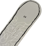 K2 Women's First Lite 2024 snowboard features a white base with gray floral graphics.