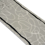 K2 Women's First Lite snowboard, 2024 model, features a gray and white graphic design.