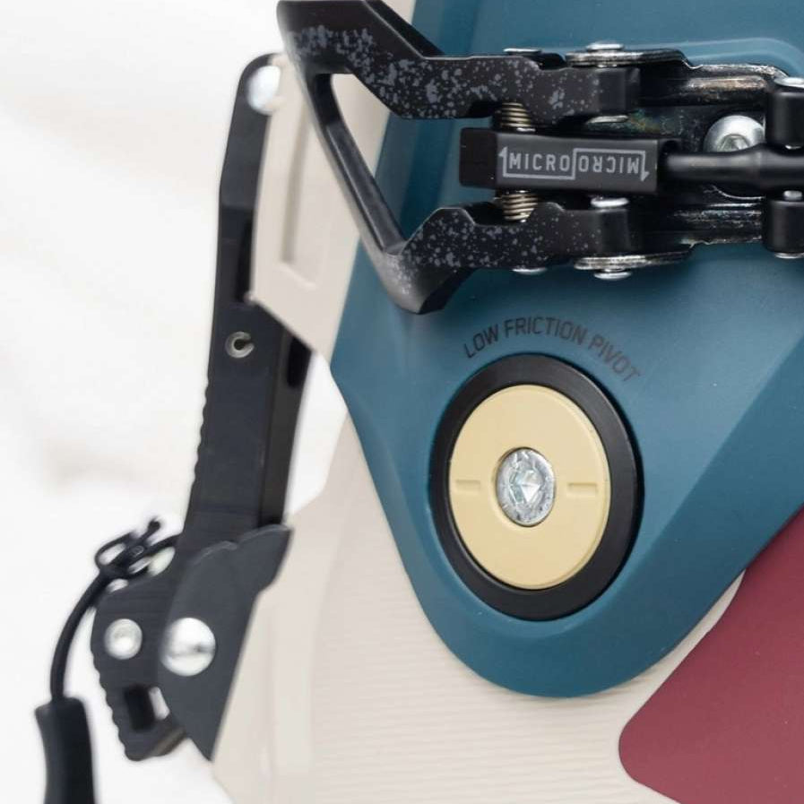 K2 Mindbender 95 BOA women's ski boots feature a blue and white design with visible BOA adjustment dials.