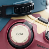 K2 Mindbender 95 BOA ski boot features a red and black color scheme with a visible BOA dial.