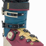 K2 Mindbender 95 BOA ski boots feature a blue and orange color scheme with a distinctive design.