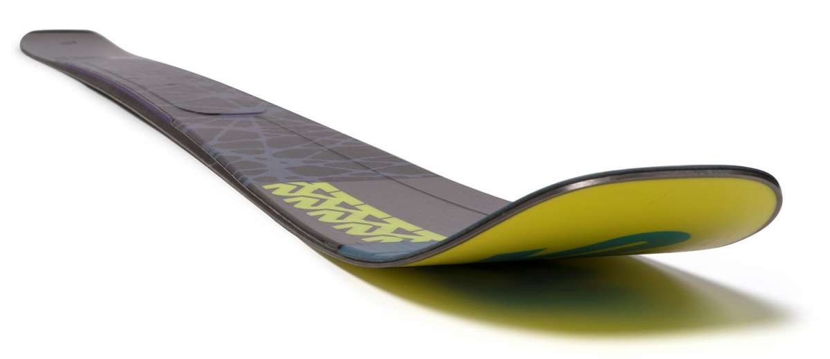 The K2 Ladies Mindbender 98Ti Alliance Flat Ski 2021-2022 is a yellow and black ski with a unique design, featuring a flat top for better control and stability.