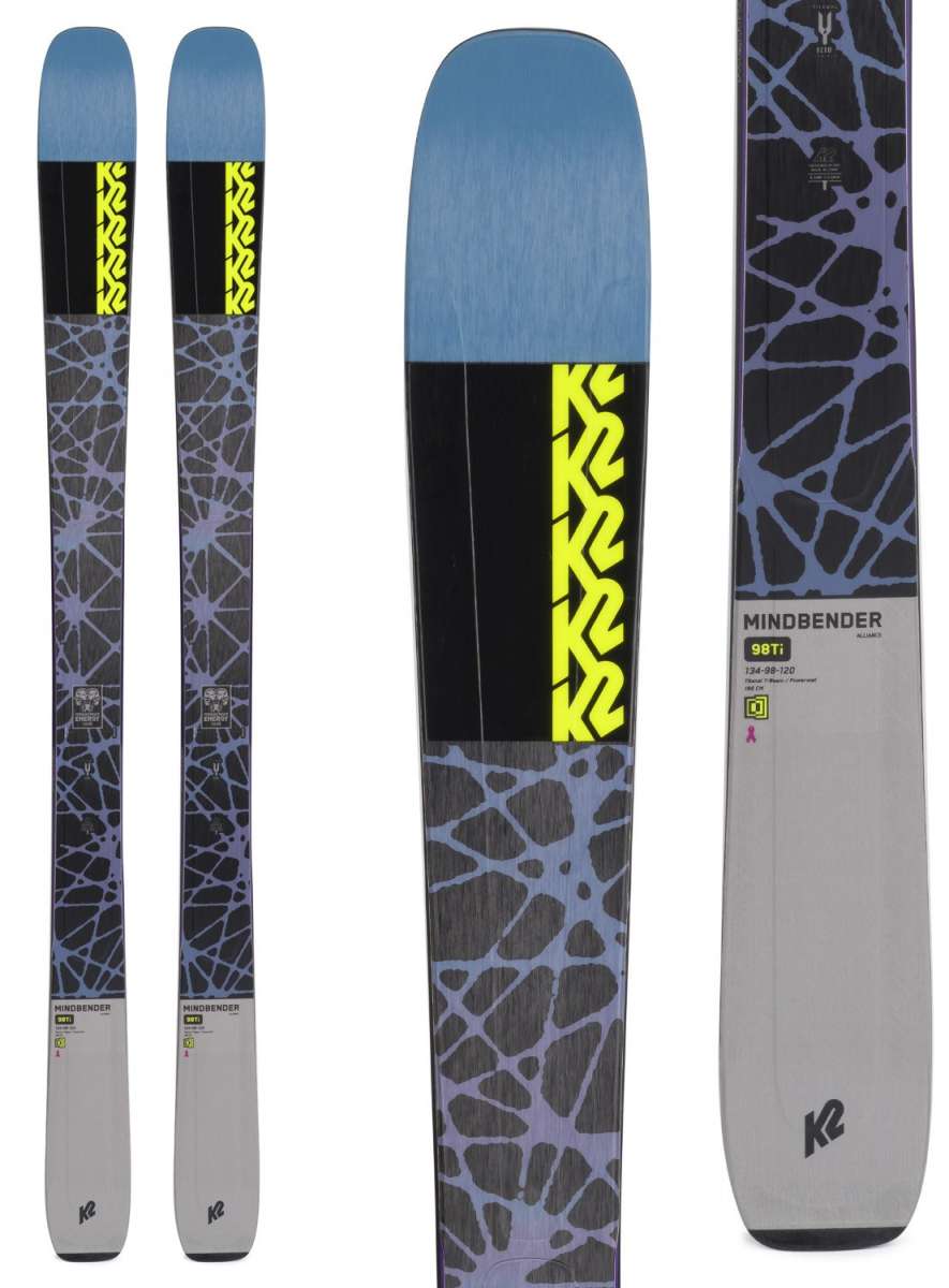 Two pairs of K2 Ladies Mindbender 98Ti Alliance Flat Skis for the 2021-2022 season, with a black and white camouflage pattern on top.