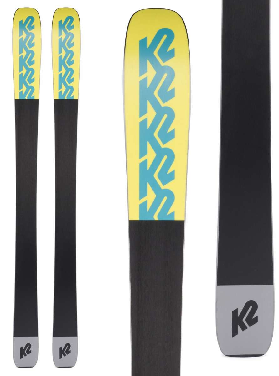 The image shows a pair of K2 Ladies Mindbender 98Ti Alliance Flat Skis for the 2021-2022 season. The skis are black with yellow and blue accents, featuring the K2 logo on the tips.