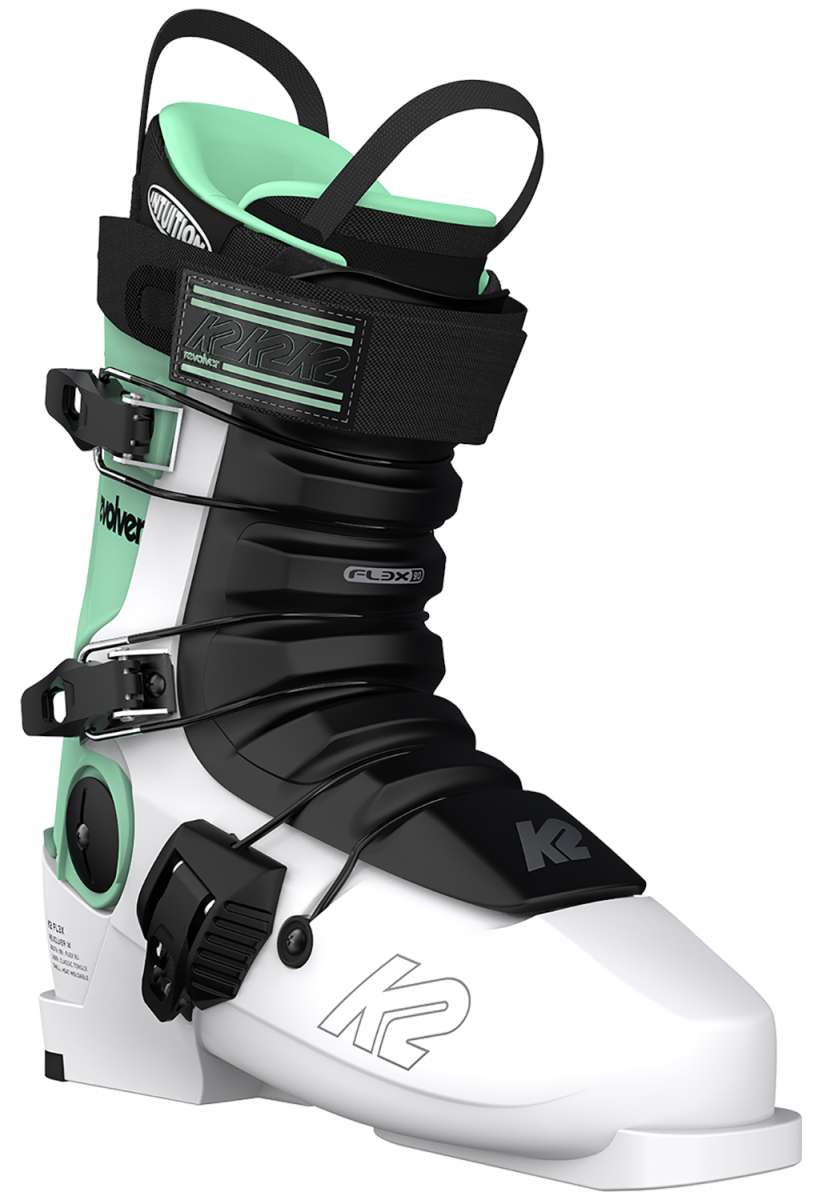 White K2 Revolver ski boots feature green accents and black hardware.