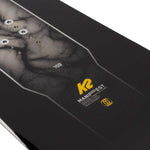 K2 Manifest snowboard features a black and white graphic design.