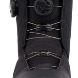The K2 Maysis Clicker X HB Snowboard Boot is a black and white snow boot with a buckle closure system. It features a sturdy design, suitable for winter sports like skiing or snowboarding. The boot has a lace-up front and a pull tab on the back for easy entry.