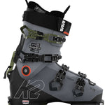 Green and black K2 Mindbender 100 MV ski boots feature a distinctive design and visible branding.